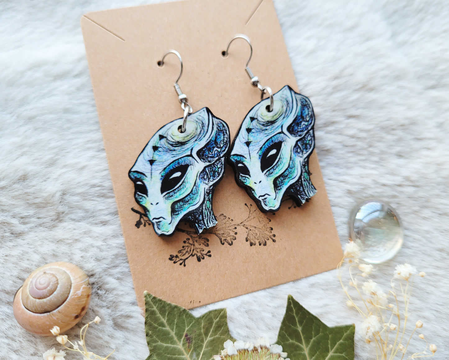 Blue Alien illustrated earrings, responsibly sourced cherry wood, 304 Stainless Steel hooks, by Grace Moth