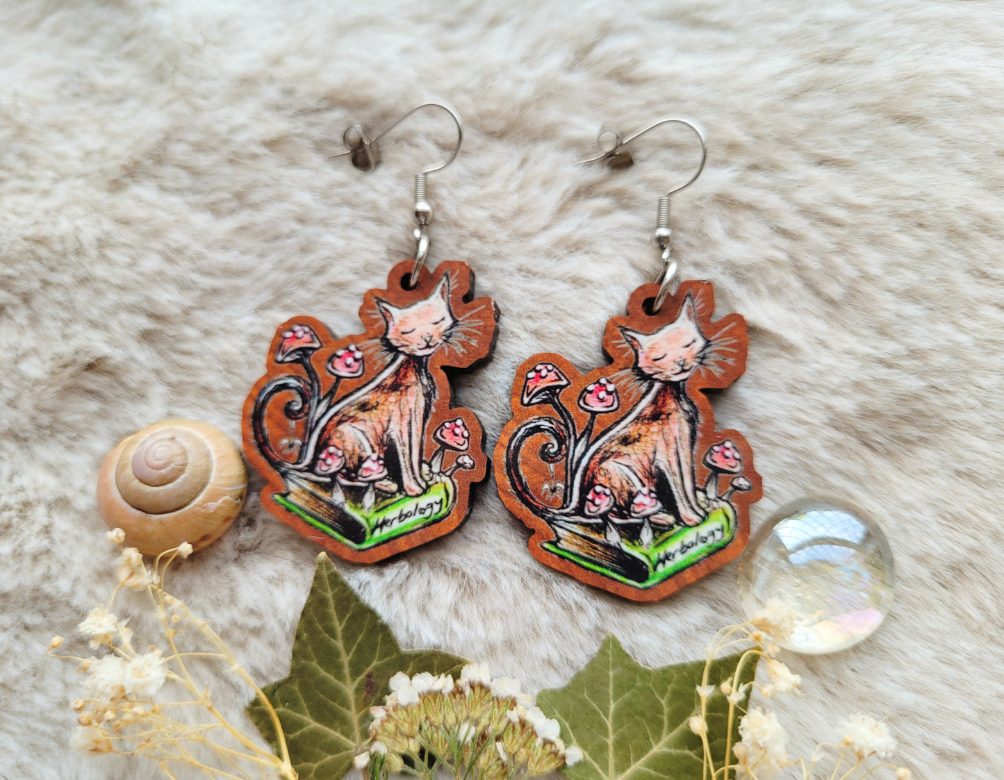 Bookworm Cat illustrated earrings, responsibly sourced cherry wood, 304 Stainless Steel hooks, by Grace Moth
