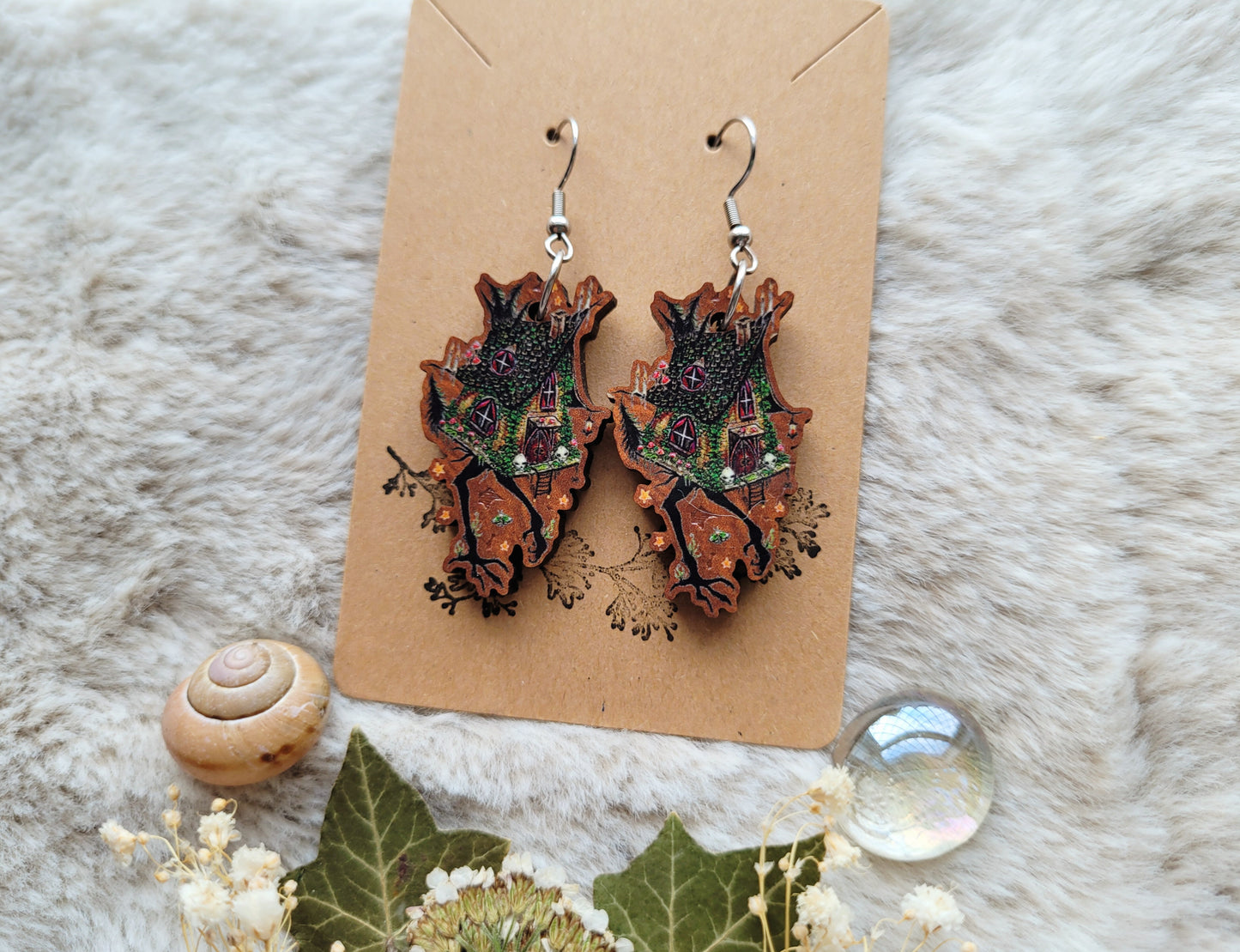 Baba Yaga witches hut illustrated earrings, responsibly sourced cherry wood, 304 Stainless Steel hooks, by Grace Moth