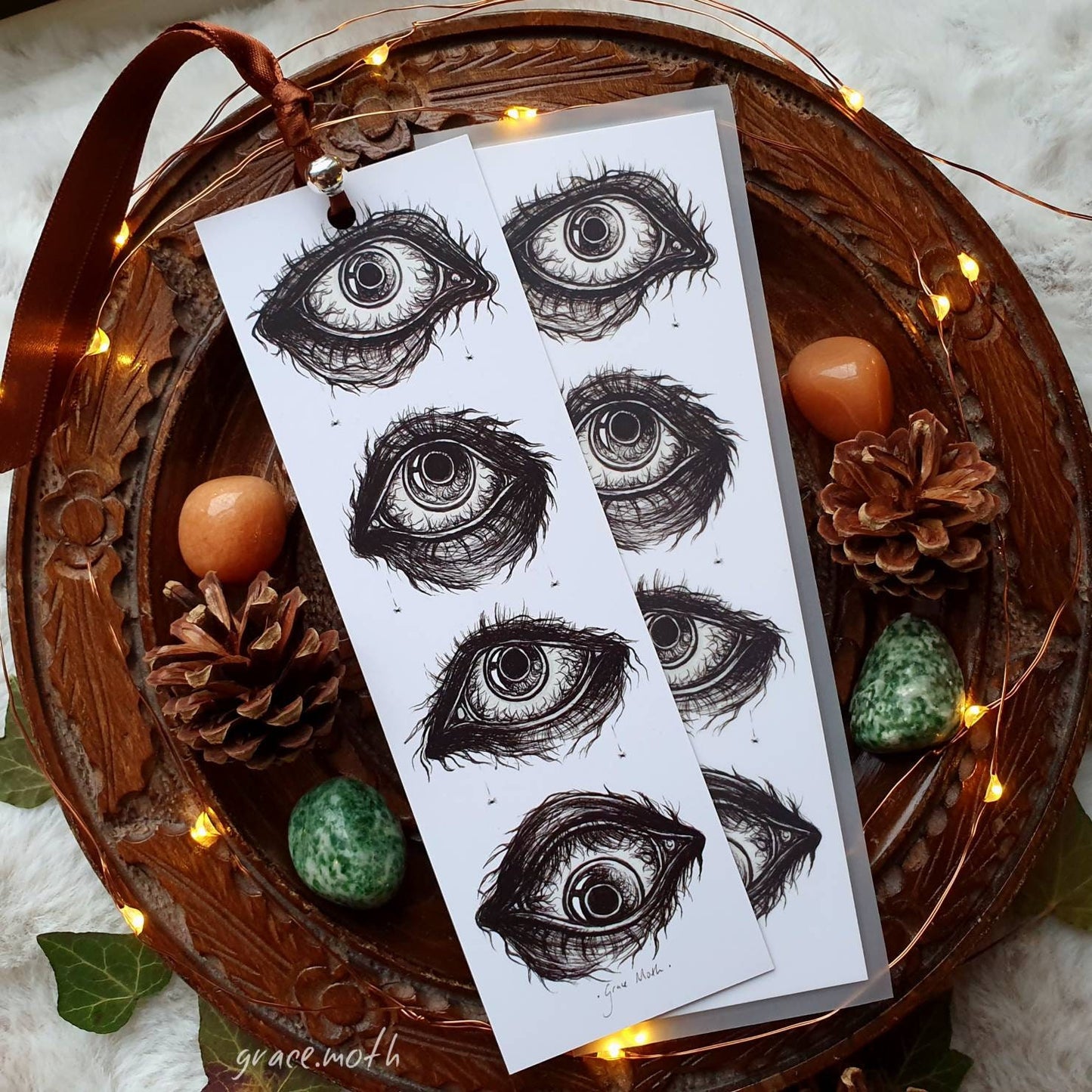 Creepy Eyes Bookmark - illustrated by Grace Moth, ribbon and laminating options