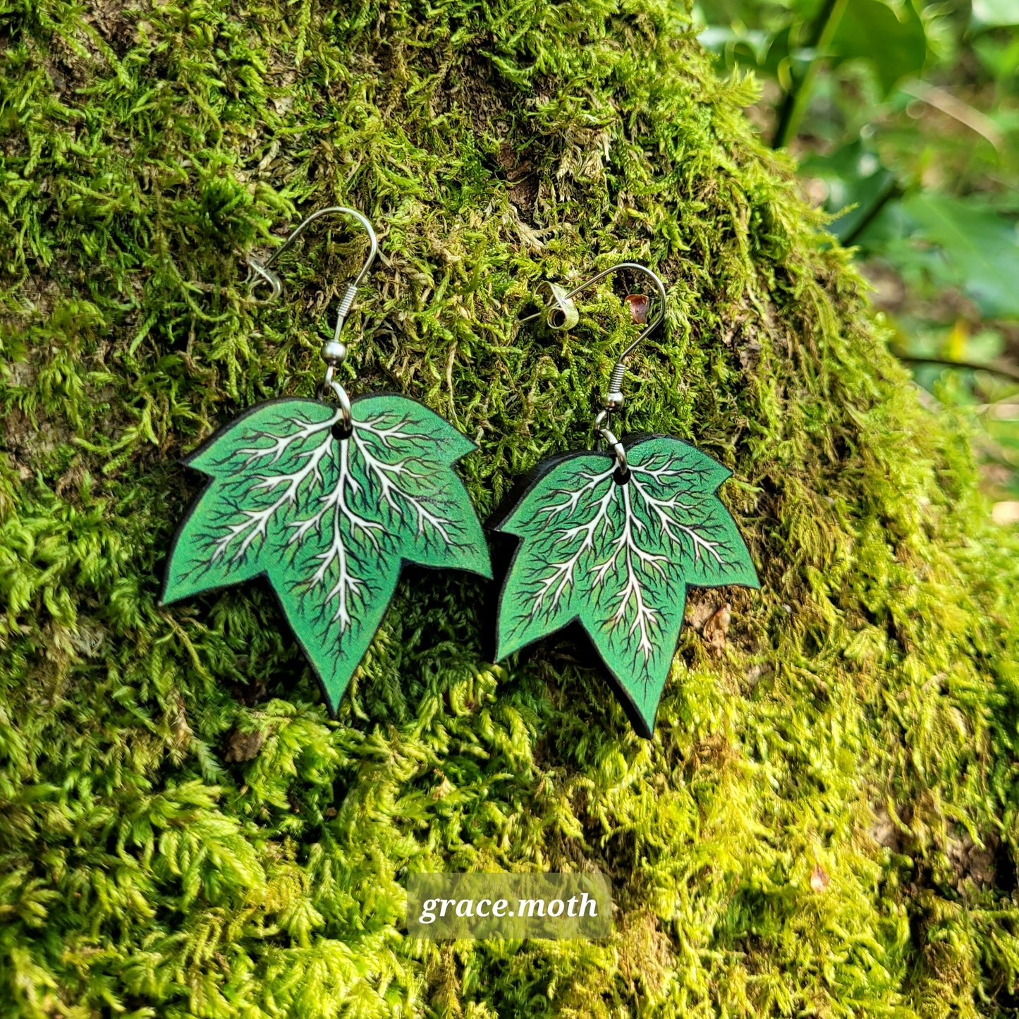Poison Ivy illustrated earrings, responsibly sourced cherry wood, 304 Stainless Steel hooks, by Grace Moth