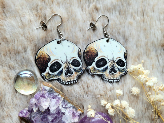 Skull illustrated earrings - responsibly sourced cherry wood, 304 Stainless Steel hooks, by Grace Moth
