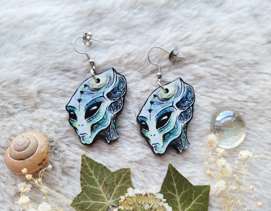 Blue Alien illustrated earrings, responsibly sourced cherry wood, 304 Stainless Steel hooks, by Grace Moth