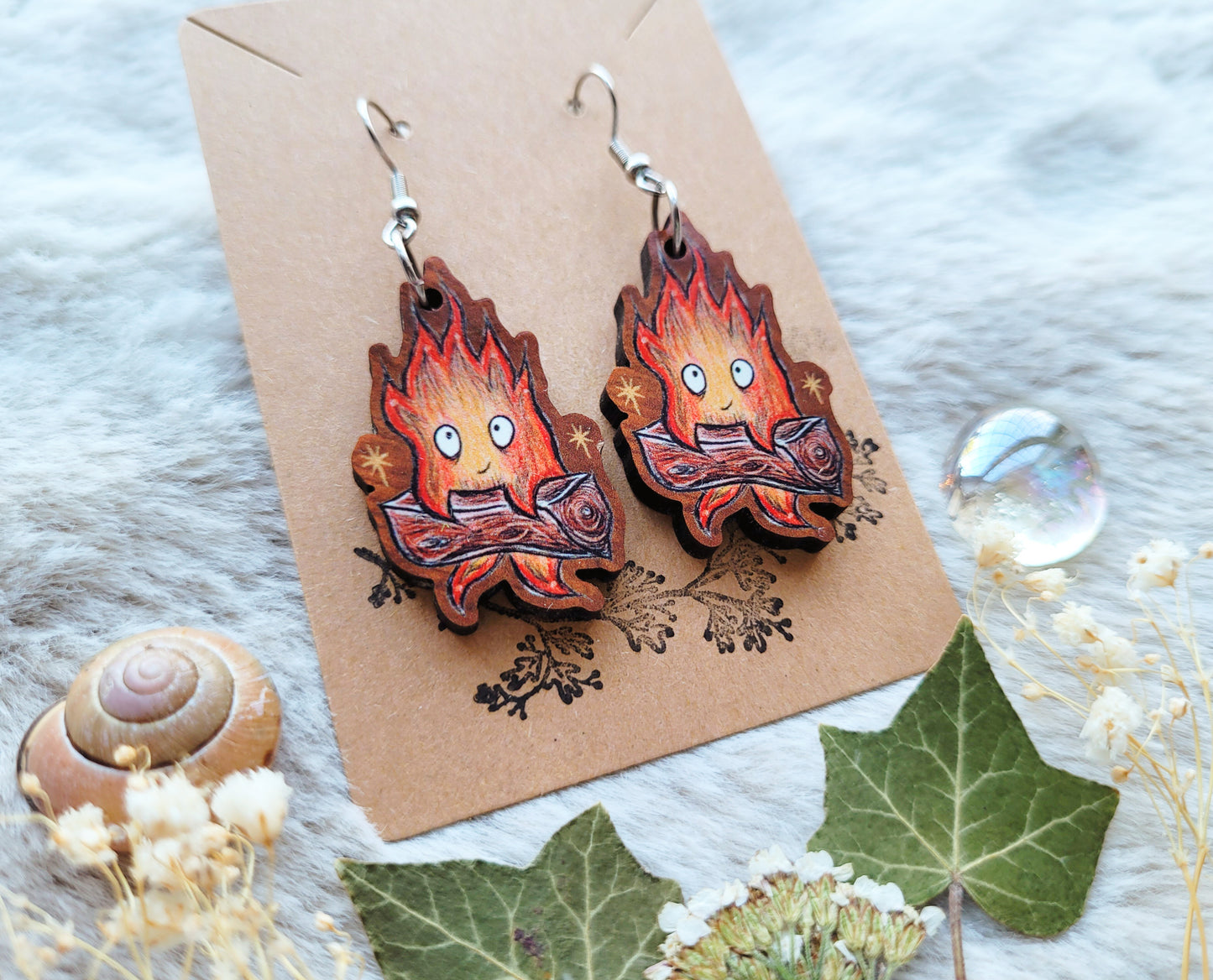Fire Spirit illustrated earrings, anime inspired, responsibly sourced cherry wood, 304 Stainless Steel hooks, by Grace Moth
