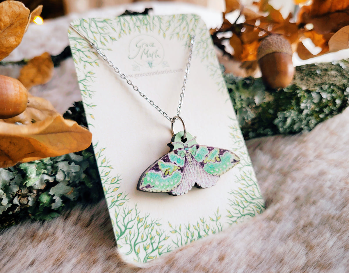 Green Carpet Moth necklace, responsibly sourced cherry wood, watercolour entomology, by Grace Moth