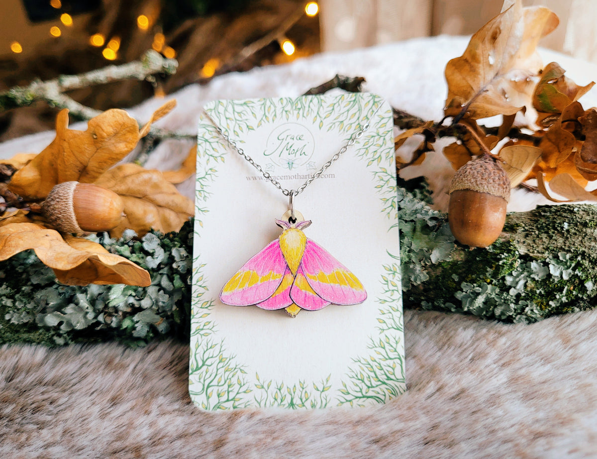 Rosy Maple Moth necklace, responsibly sourced cherry wood, pink watercolour entomology, by Grace Moth