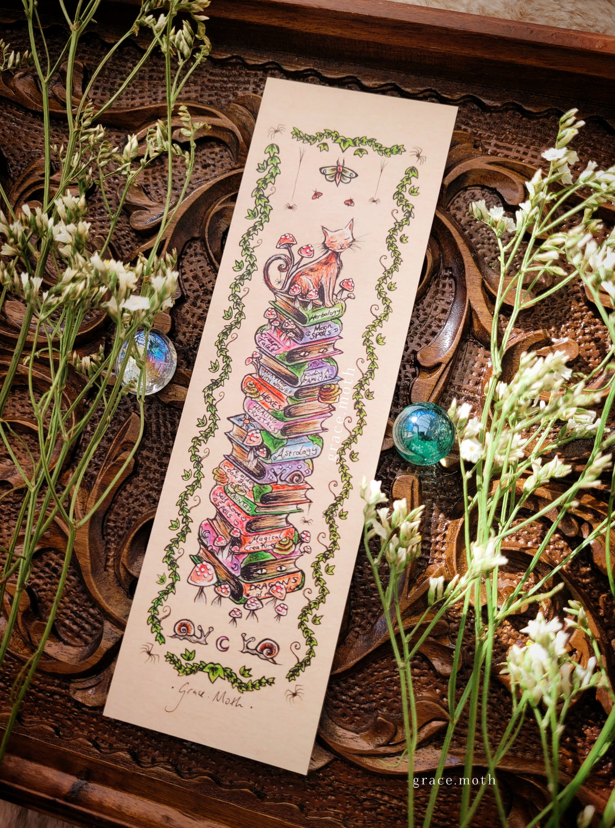 Book Pile with Cat Bookmark - illustrated by Grace Moth, Fantasy novels