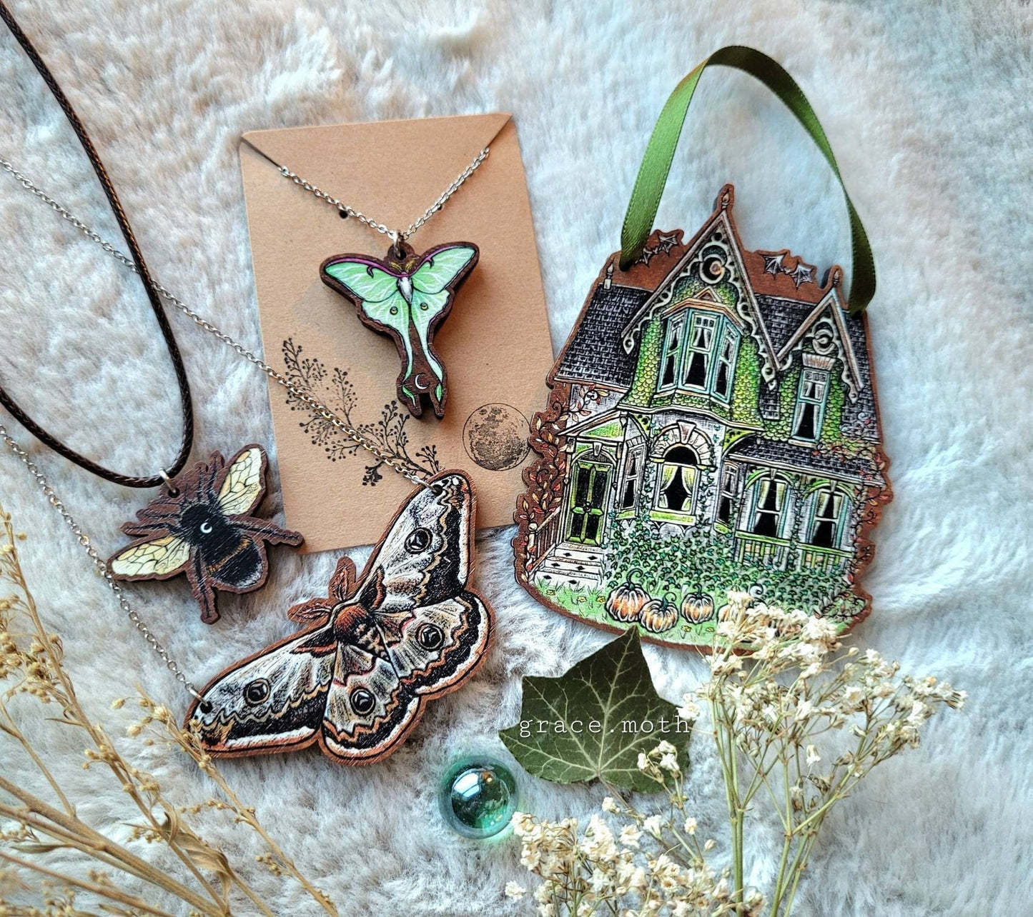 Haunted House illustrated earrings, responsibly sourced cherry wood, 304 Stainless Steel hooks, by Grace Moth